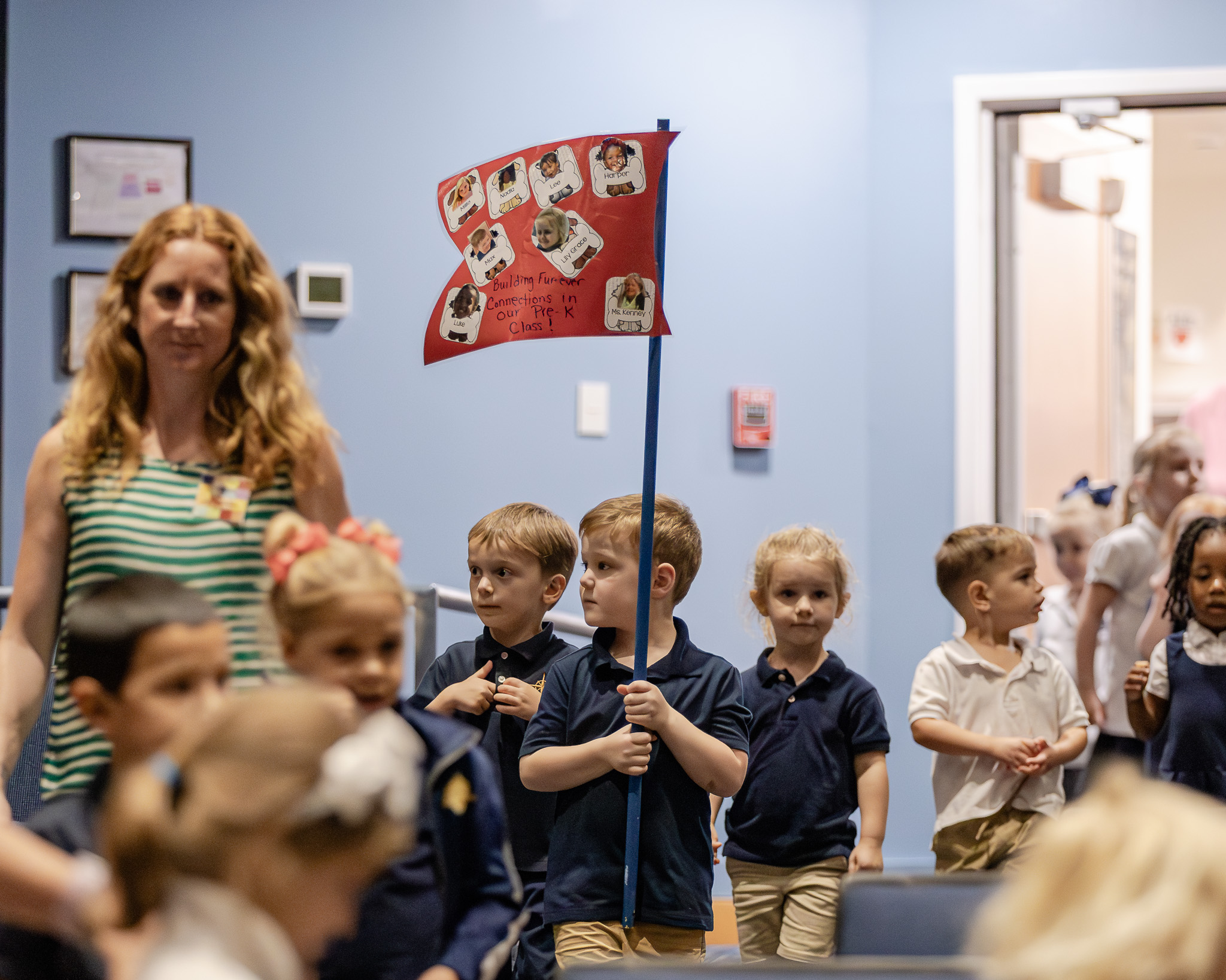 HRA Lower School Leadership Assembly flag bearer